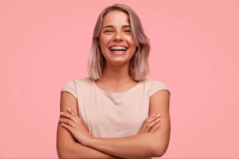 Woman smiling with braces.