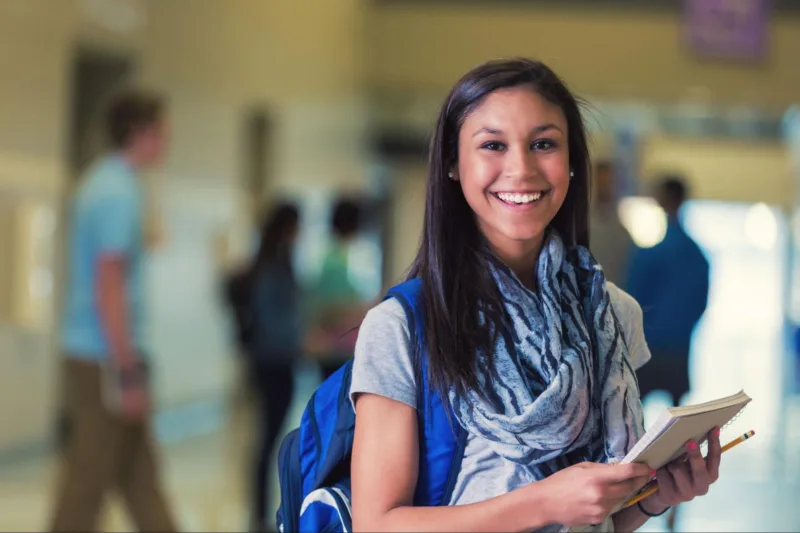 Student wearing clear aligners during the school year.