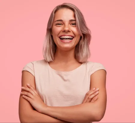 Woman smiling with braces.