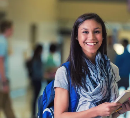 Student wearing clear aligners during the school year.
