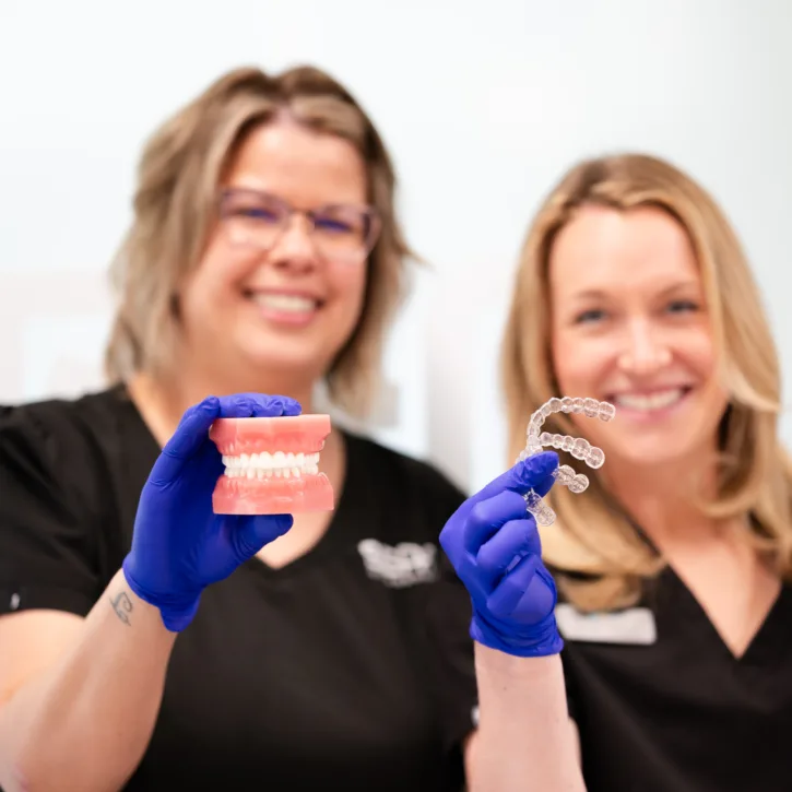 Beam team showing off some custom dental retainers